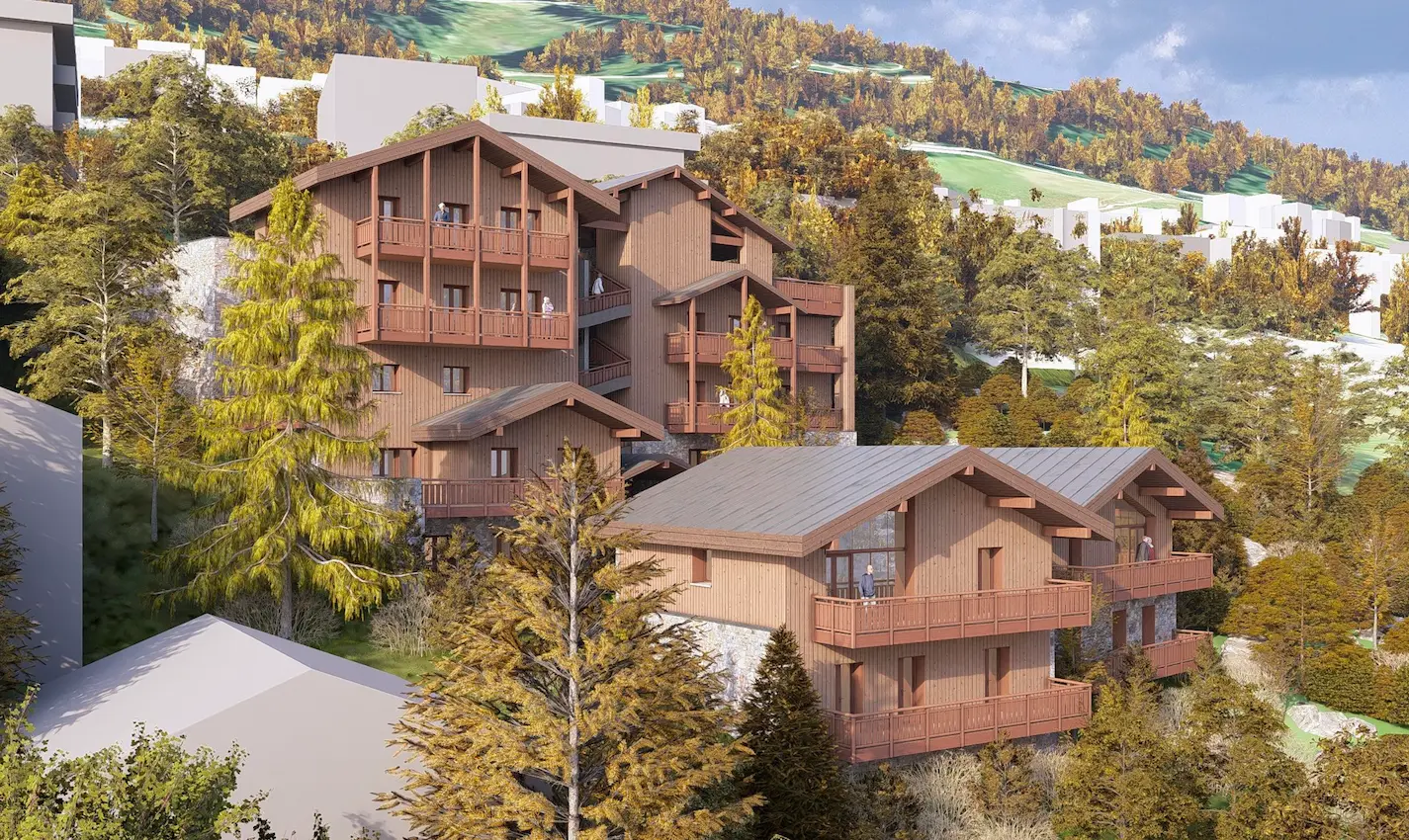 Cette perspective aérienne présente un ensemble immobilier de montagne composé de plusieurs bâtiments d'architecture alpine contemporaine. Le projet s'inscrit harmonieusement sur un terrain en pente douce, en bordure de forêt et à proximité immédiate des pistes de ski visibles en arrière-plan. L'architecture privilégie une approche traditionnelle revisitée : façades entièrement habillées de bardage bois vertical dans des tons naturels qui évolueront avec le temps, toits à double pente recouverts de bac acier, larges balcons filants à chaque niveau et charpentes apparentes sous les pignons. Cette esthétique s'intègre parfaitement au caractère alpin du site. Le bâtiment principal, de plus grande envergure, s'organise sur quatre niveaux avec de généreux balcons offrant des vues dégagées sur le domaine skiable. À ses côtés, un chalet de taille plus intimiste reprend les mêmes codes architecturaux. Les volumes s'articulent de manière à optimiser l'ensoleillement et les vues tout en préservant l'intimité de chaque logement. L'implantation respecte la topographie naturelle et privilégie une insertion paysagère soignée : arbres feuillus aux couleurs automnales dorées, conifères, et végétation préservée créant un écrin de verdure autour des constructions. L'arrière-plan révèle les pistes vertes du domaine skiable serpentant entre les zones boisées et quelques résidences existantes.